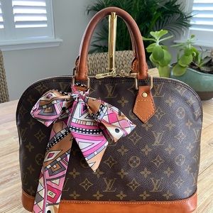 Louis Vuitton Alma Handbag